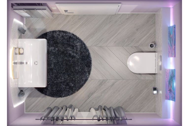 Pohled shora na koupelnu s umyvadlem, toaletou, zrcadlem a kulatým kobercem