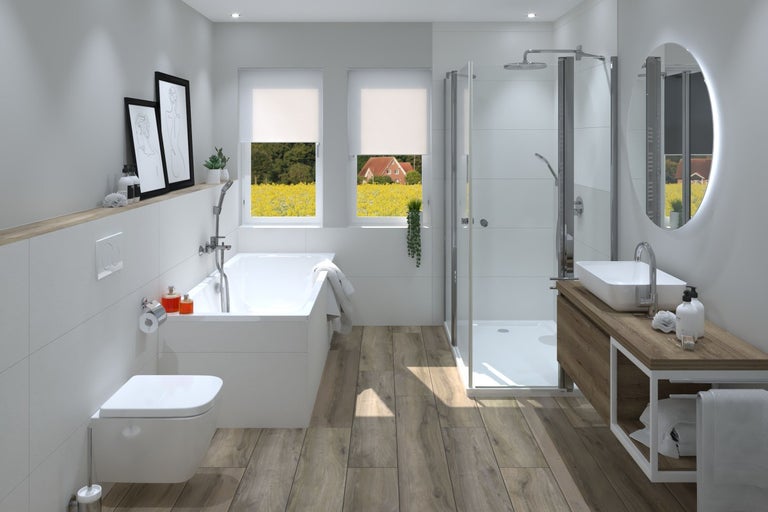 Koupelna se světlým designem s vanou, sprchou, umyvadlem a toaletou