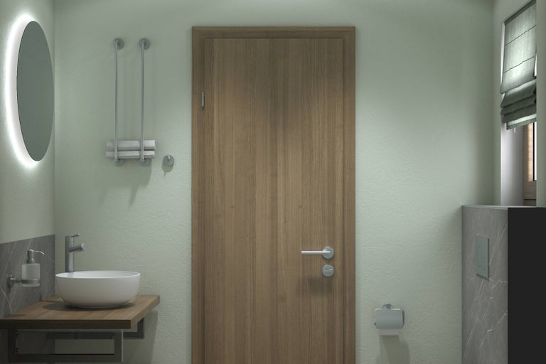 Koupelna s umyvadlem, zrcadlem, dveřmi a toaletou.