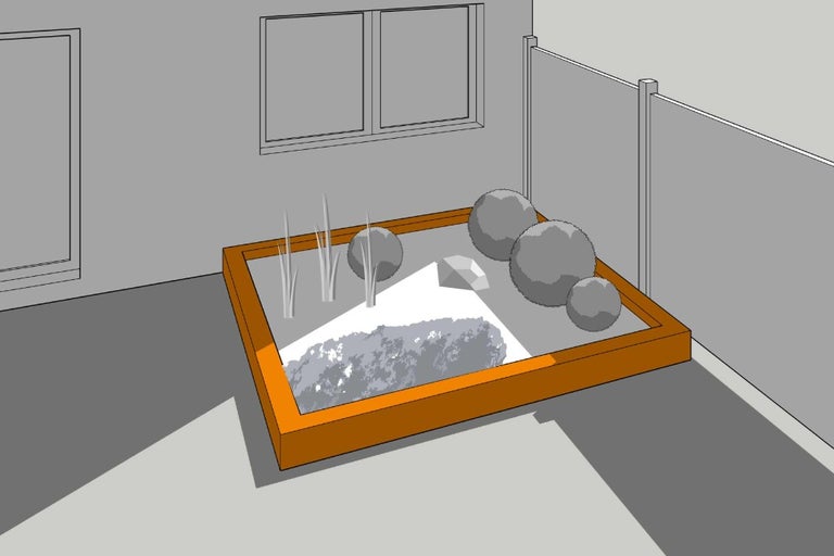 Příklad vyvýšené zahrady s rostlinami a kameny