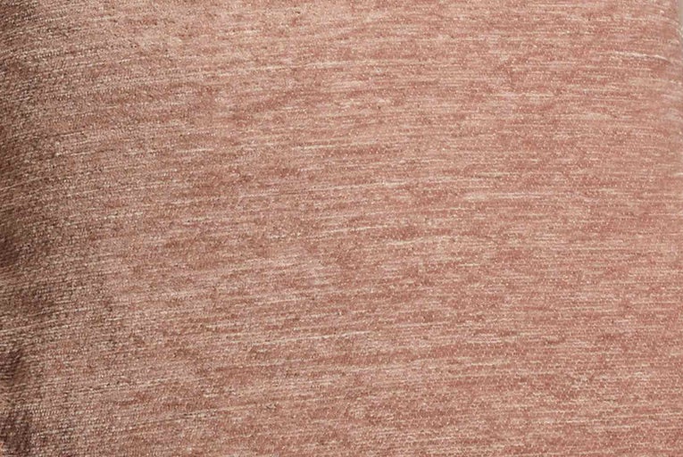 Detailní záběr textilního materiálu s jemnou texturou