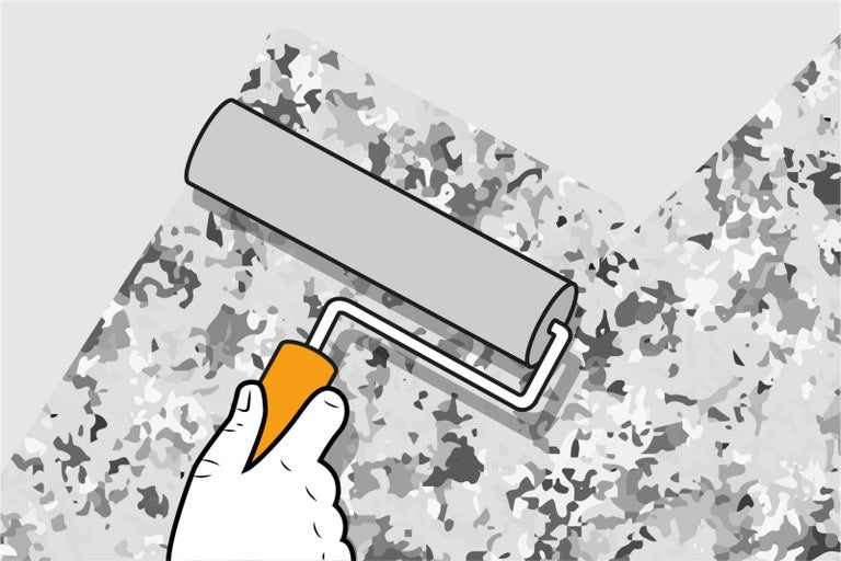 Ruka drží malířský váleček, který natírá vzorovaný povrch.