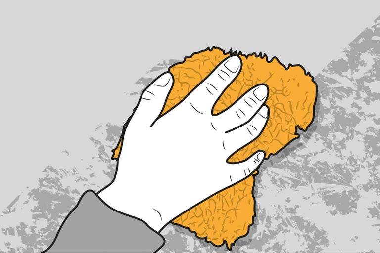 Ilustrace ruky čistící stěnu houbou