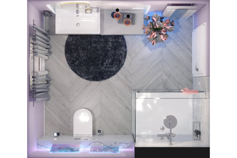 Pohled shora na koupelnu s umyvadlem, toaletou, vanou a dekorem