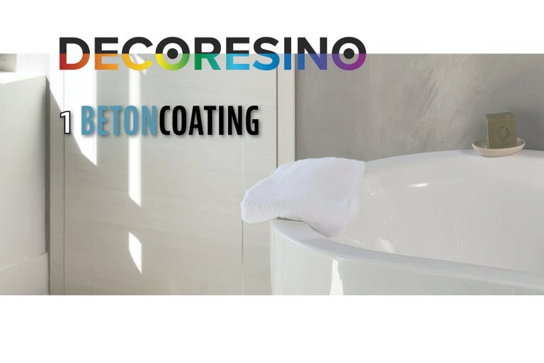 Koupelna s betonovou stěrkou a bílou vanou