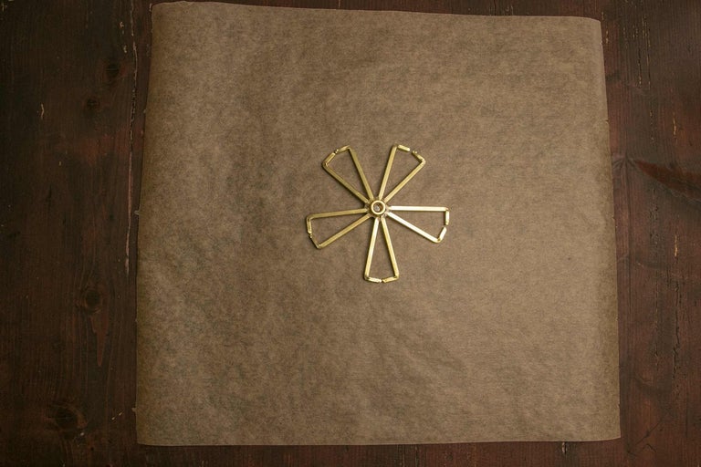 Hvězdicovitý zarovnávací nástroj na papíře