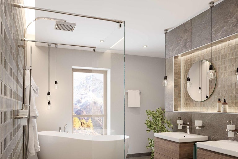 Světlá koupelna s vanou, sprchou a umyvadly