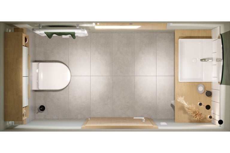 Pohled shora na koupelnu s toaletou, umyvadlem, držákem na ručníky a vanou