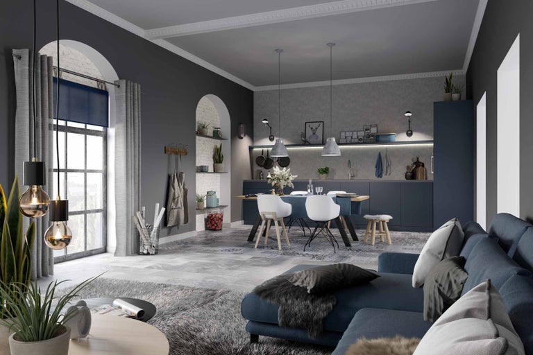 Obývací kuchyně s jídelním stolem, židlemi, pohovkou a dekorativními předměty v obývacím pokoji