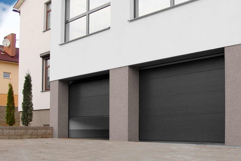 Garážová vrata u moderního domu