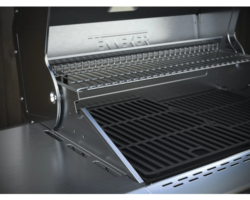 Vnitřní pohled na gril z nerezové oceli s roštem a ohřívacím roštem