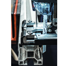 Detail pohledu na přímočarou pilu řezající kovový profil.