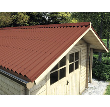 Zahradní kůlna s červenou vlnitou plechovou střechou