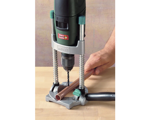 Vrtací stojan Wolfcraft s vrtačkou a měděnou trubkou