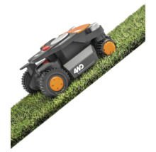 Robotická sekačka na trávníku