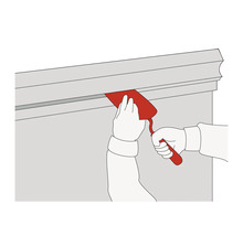 Ilustrace osoby používající špachtli k spárování