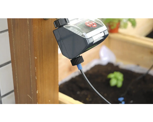 Zavlažovací počítač s hadicí a kohoutkovou přípojkou pro zavlažování zahrady