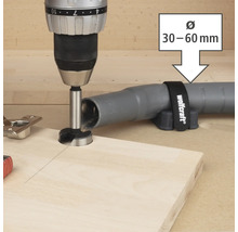 Forstnerův vrták v provozu s odsáváním prachu od společnosti Wolfcraft