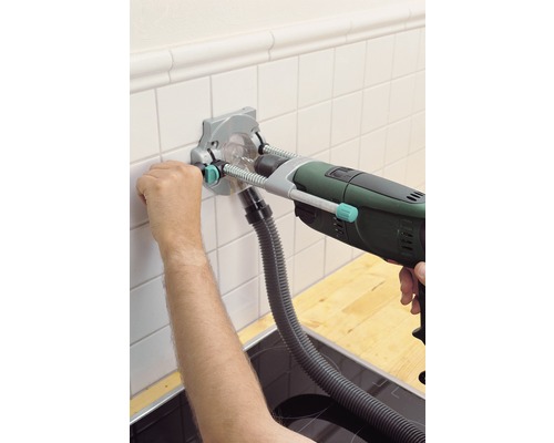 Pomůcka pro vrtání do dlaždic s vrtačkou používanou k vrtání otvorů do dlaždic