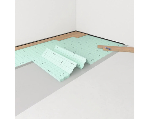 Pokládka kročejové izolace v místnosti.