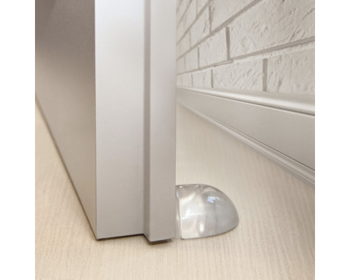 Plastová zarážka dveří ve spodní části dveří