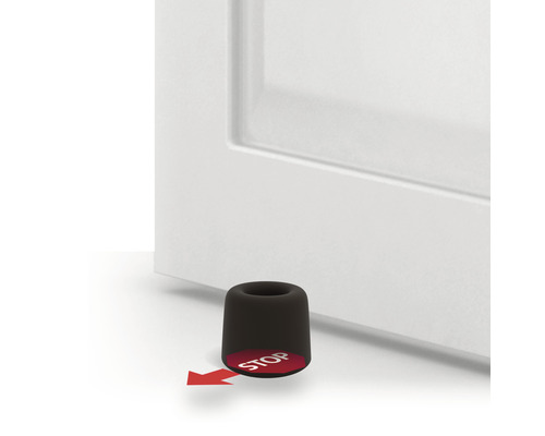 Dveřní zarážka před dveřmi s červeným symbolem stop a šipkou