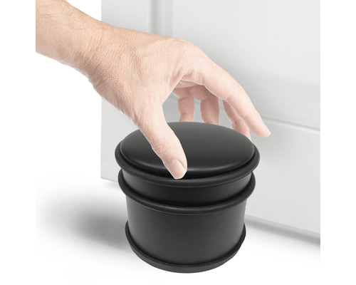 Černý gumový dveřní zarážka s rukou u dveří