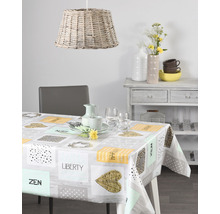 Jídelní stůl s potaženým ubrusem s geometrickými a tematickými vzory