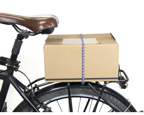 Balík na nosiči kola s upínacím popruhem