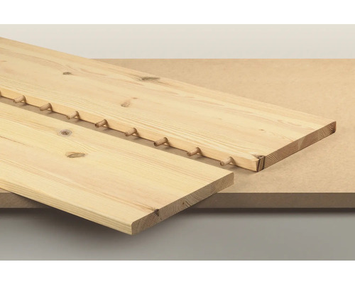 Dvě dřevěné desky s kolíky pro spojování dřeva