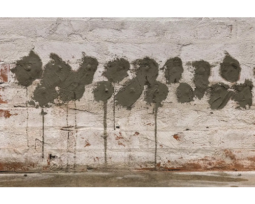 Opravená cihlová zeď s maltou