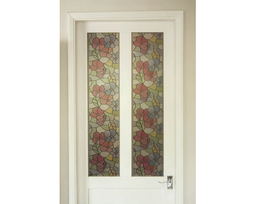 Bílé dveře s květinovým skleněným designem