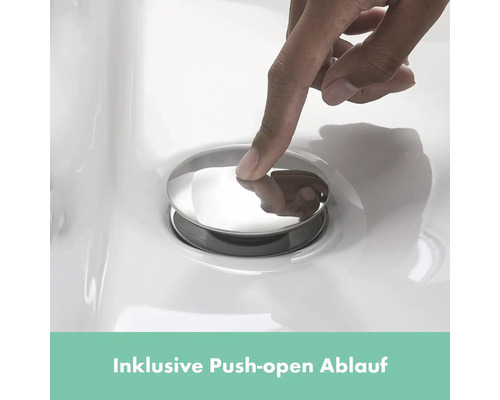 Ruka ovládá výpusť Push-Open v umyvadle