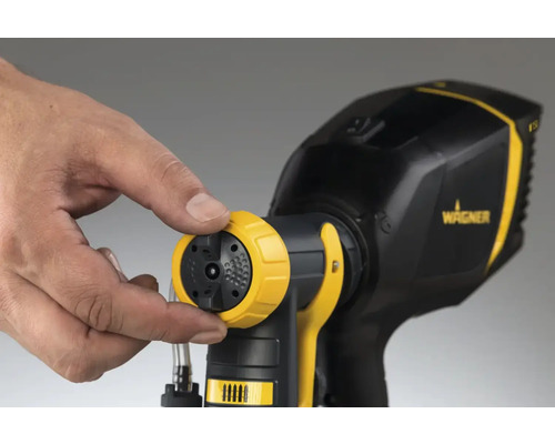 Stříkací systém s nastavitelnou tryskou v ruce