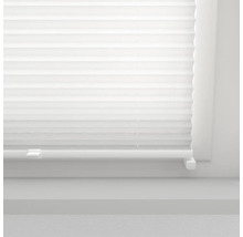 Detailní záběr plisované žaluzie na okně