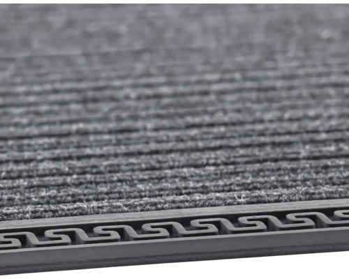 Detailní záběr rohožky s řeckým motivem meandru