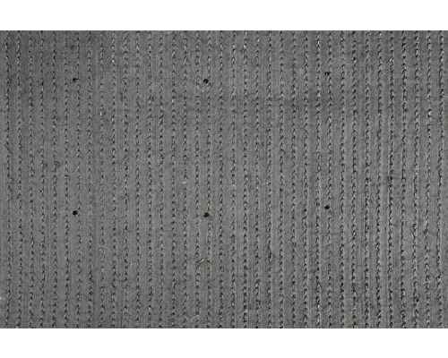 Detailní záběr umělé trávy s vertikálními pruhy