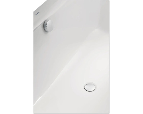 Detailní pohled na bílé umyvadlo Duravit s chromovaným vypouštěcím ventilem a přepadem