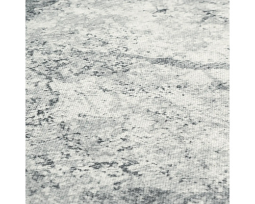 Detail koberce s abstraktním vzorem