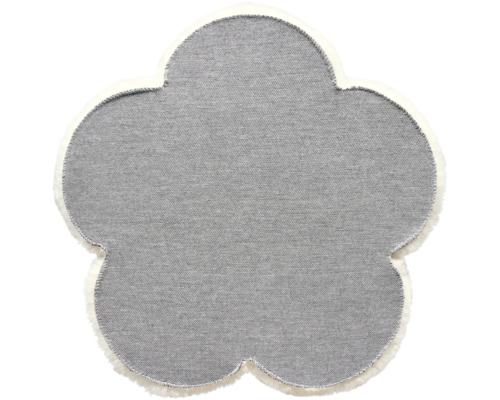 Koberec ve tvaru květiny s texturou a okrajem