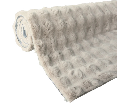 Srolovaná měkká deka s reliéfním vzorem