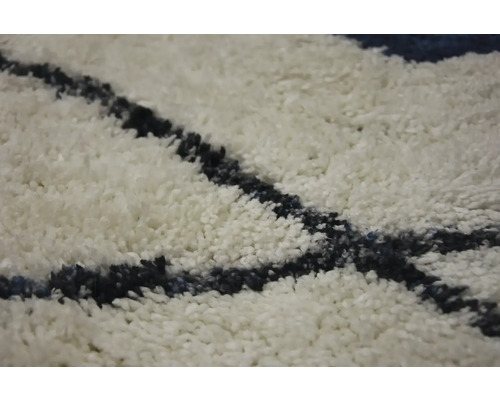 Detail koberce se vzorem
