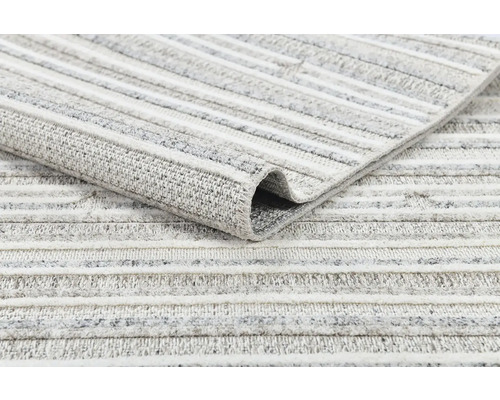 Detail pruhovaného koberce