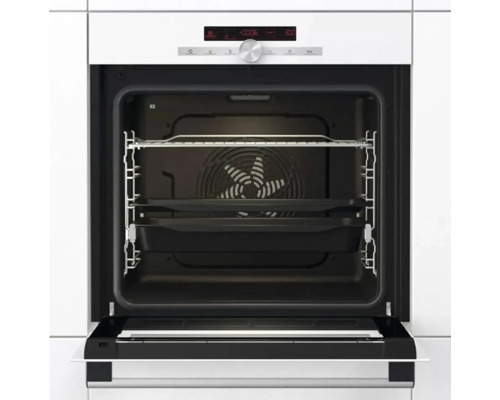 Otevřená trouba s plechem na pečení a grilovací mřížkou