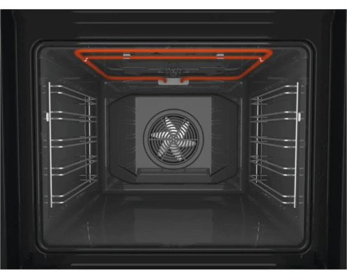 Vnitřní pohled na troubu s topným tělesem a ventilátorem