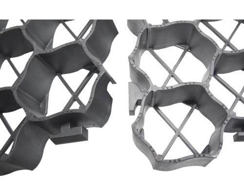 Detailní záběr na zatravňovací dlaždice z plastu pro stabilizaci půdy.