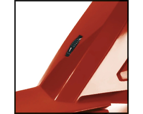 Detail červeného zařízení s nastavovacím knoflíkem