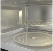 Vnitřek mikrovlnné trouby s otočným talířem a grilovací mřížkou