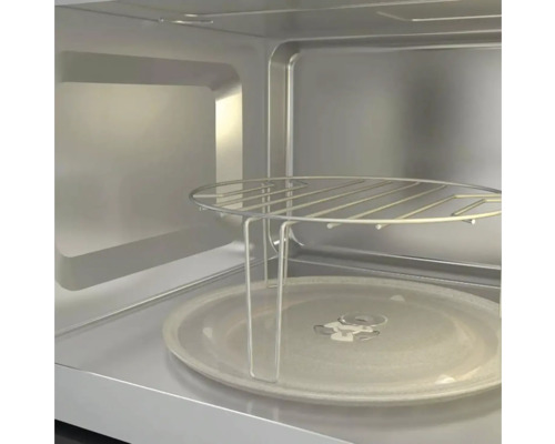 Vnitřek mikrovlnné trouby s otočným talířem a grilovací mřížkou