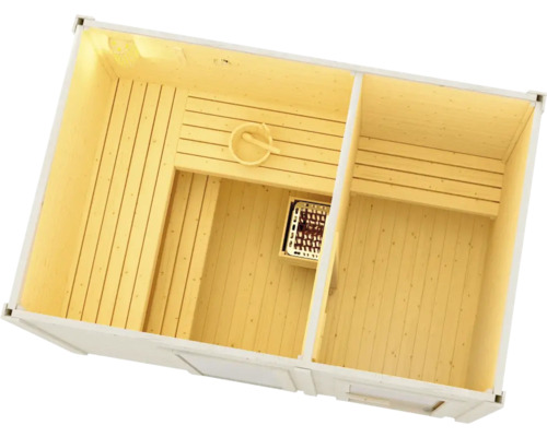 Vnitřní pohled na dřevěnou saunu s lavicemi, kamny a příslušenstvím